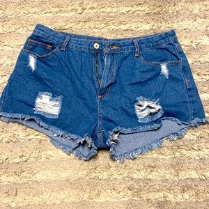 Distressed denim shorts
